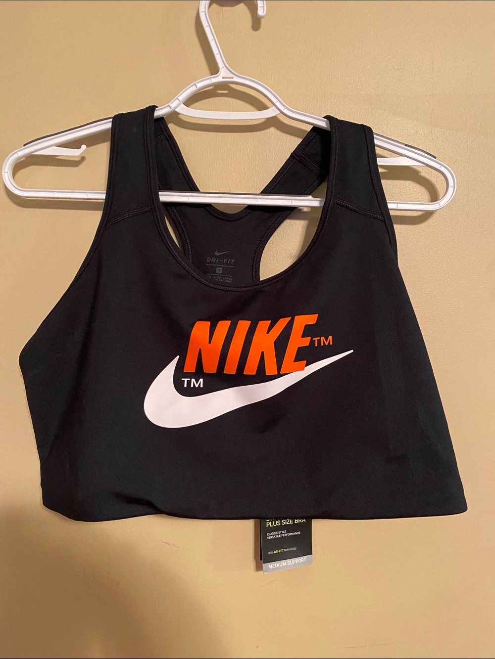 Nike Retro Sports Bra with Orange Logo and White Swoosh